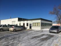 On location at Neuls Springs & Auto Glass , a Auto Glass Repair Shop in Winnipeg, MB